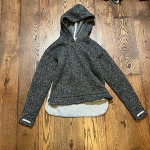 Sweater with thumb holes and a pocket in the front for your hands